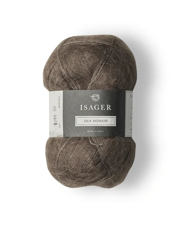 A skein of Isager Silk Mohair in soft brown with a branded label—“Made in Italy”—perfect for knitting your next project like the Cumulus Blouse using the Cumulus Blouse neuleohje + Isager Silk Mohair set.