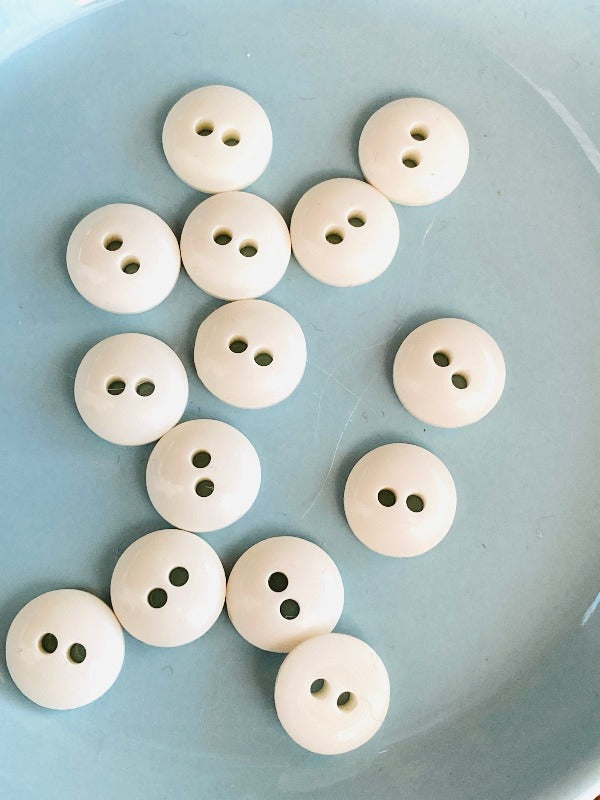 Smooth button 0.9mm, convex - White