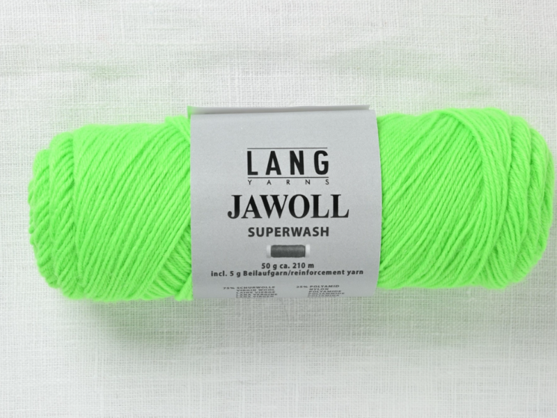 A skein of neon green Timo sukka ohje fingerin ja Lang jawoll yarn rests on a white textured surface, its label detailing weight, length, and reinforcement—ideal for knitting socks or following any neulontaohje.