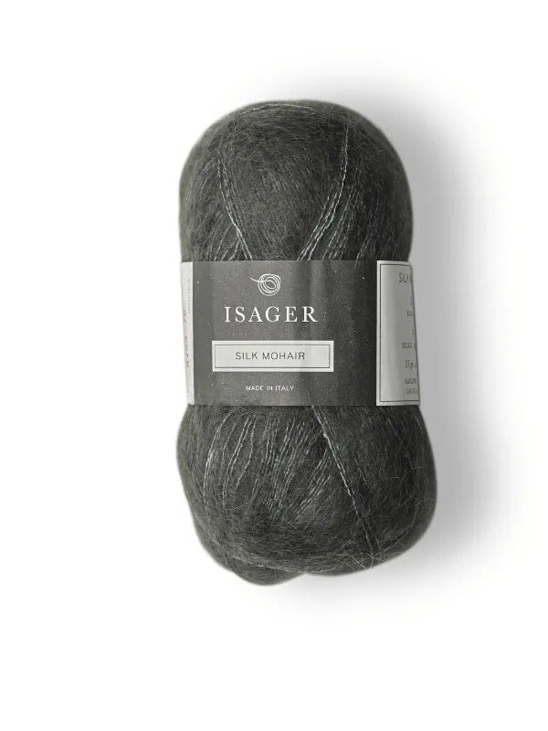 The Cumulus Blouse neuleohje + Isager Silk Mohair features dark grey, soft yarn with a gray label and white text—perfect for creating fuzzy knits like the Cumulus Blouse or your next cozy project.