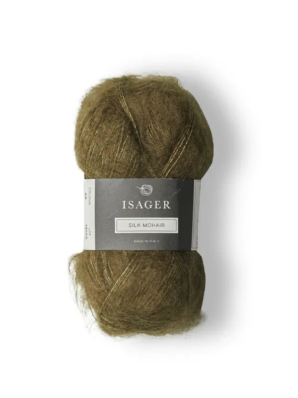 A ball of olive green Isager Silk Mohair yarn with a gray and white label, shown on a white background, is perfect for your next Cumulus Blouse neuleohje project with the Cumulus Blouse neuleohje + Isager Silk Mohair set.