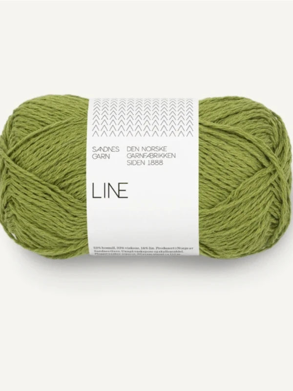 A skein of green yarn labeled "LINE" by Sandnes Garn, wrapped with a white label in Norwegian—perfect for Milly Sweater & Skirt Neuleohje Suomi +Sandnes Garn line projects.
